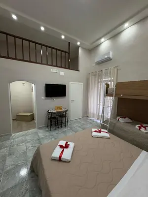 Letto o letti in una camera di B&B A da’ ziett