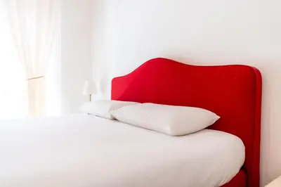 Letto o letti in una camera di Tombolata