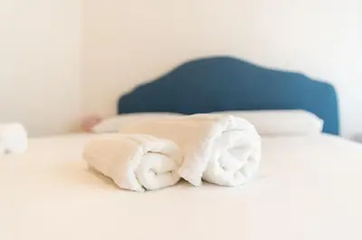 Letto o letti in una camera di Tombolata