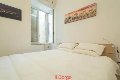 Letto o letti in una camera di Il Borgo