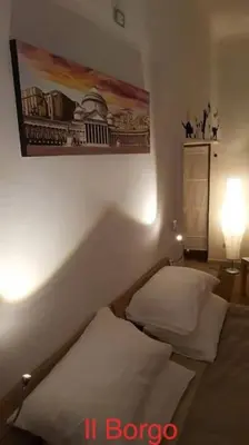 Letto o letti in una camera di Il Borgo