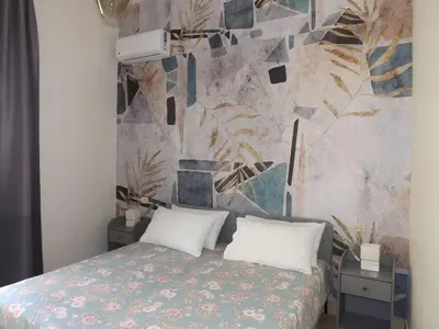 Letto o letti in una camera di IL MIGLIO