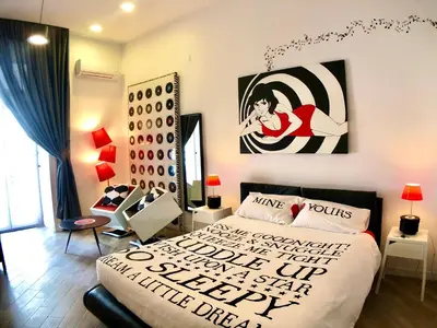Letto o letti in una camera di M99 Design Rooms