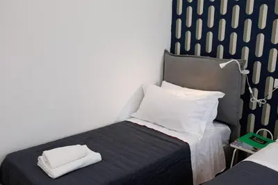 Letto o letti in una camera di House in Decumani Entire Apartment By HouseinNaples