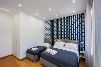 Letto o letti in una camera di House in Decumani Entire Apartment By HouseinNaples
