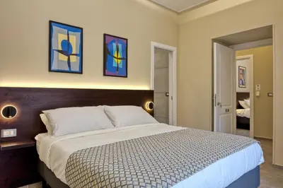 Letto o letti in una camera di Palm Suites