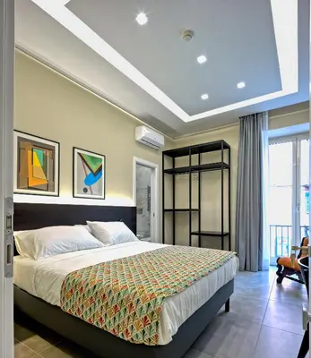 Letto o letti in una camera di Palm Suites