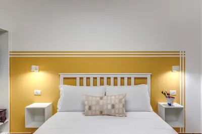 Letto o letti in una camera di Caravita Rooms