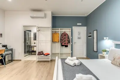 Letto o letti in una camera di Caravita Rooms