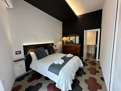 Letto o letti in una camera di Habitatio Mercatorum Guesthouse - LS Accommodations