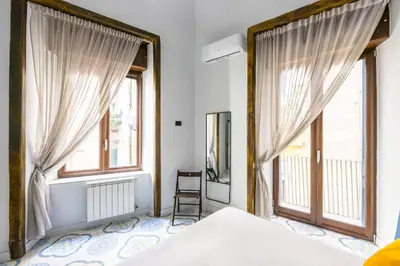 Letto o letti in una camera di Leticia's Apartment by Wonderful Italy