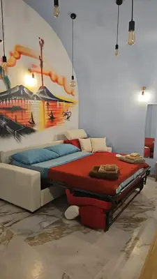 Letto o letti in una camera di Carlo di Borbone Apartments - Napoli Chiaia