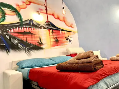 Letto o letti in una camera di Carlo di Borbone Apartments - Napoli Chiaia