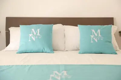Letto o letti in una camera di Mia Napoli