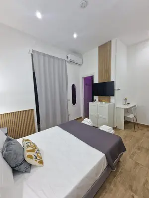 Letto o letti in una camera di Ventre luxury rooms