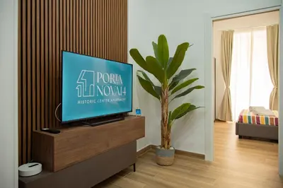 TV o dispositivi per l'intrattenimento presso Portanova14 - Historic Center Apartment