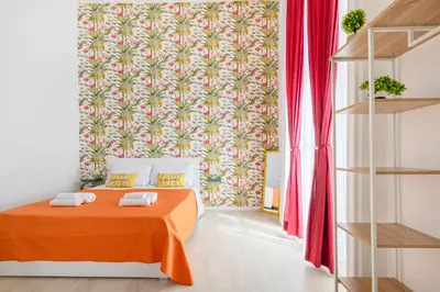 Letto o letti in una camera di Salotto Napoletano Minù