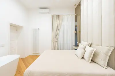 Letto o letti in una camera di ARISTOCRAT CHIAIA bridge