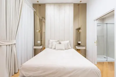 Letto o letti in una camera di ARISTOCRAT CHIAIA bridge