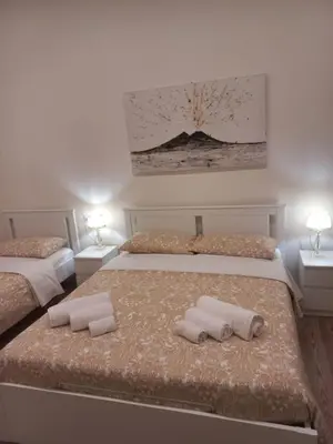 Letto o letti in una camera di La Dimora di Cinzia