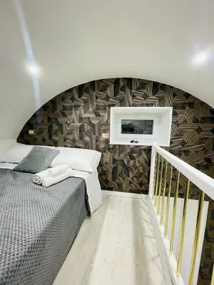 Letto o letti in una camera di Frank Anthony Home