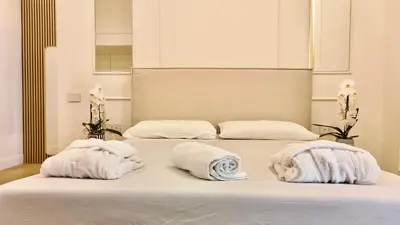 Letto o letti in una camera di Raffaella Home