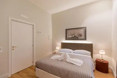 Letto o letti in una camera di Piazza San Domenico Luxury Suites