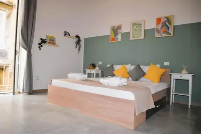 Letto o letti in una camera di Vinyls' Green Home - Toledo Centro Storico