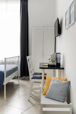 Letto o letti in una camera di Neapolis Guest House