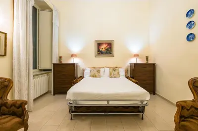 Letto o letti in una camera di Homely City Apartment by Wonderful Italy