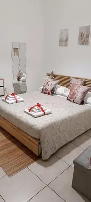 Letto o letti in una camera di Risvegli Partenopei House