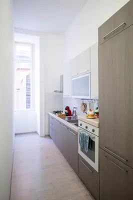 Cucina o angolo cottura di Stay Soft Apartment Napoli Balcone, Ascensore e 2 Camere nel Cuore del Centro Storico