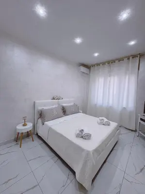 Letto o letti in una camera di La casetta di nanny