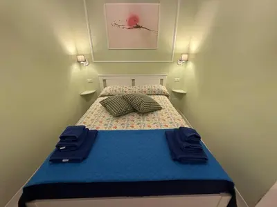 Letto o letti in una camera di La Suite del Porto Antico