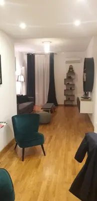 Area soggiorno di Geko Suite Chiaia