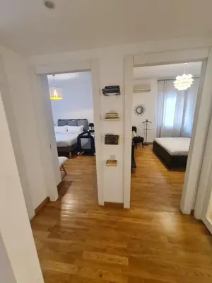 Letto o letti in una camera di Geko Suite Chiaia