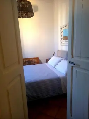 Letto o letti in una camera di 99 Scalini