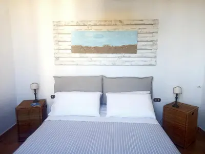Letto o letti in una camera di 99 Scalini