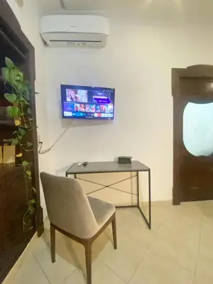 TV o dispositivi per l'intrattenimento presso Camera matrimoniale con terrazzo
