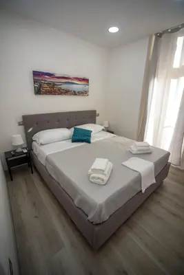 Letto o letti in una camera di NA City Rooms