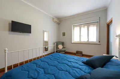 Letto o letti in una camera di Donna Giovannina