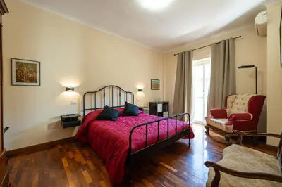 Letto o letti in una camera di Donna Giovannina