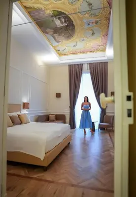 Letto o letti in una camera di Antica Dimora Pessina