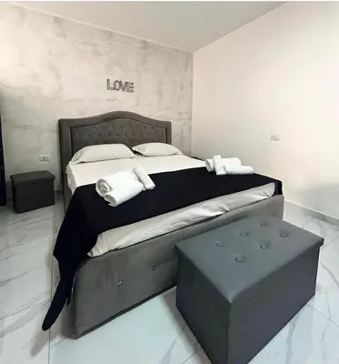 Letto o letti in una camera di Terrazza luxury Valentino