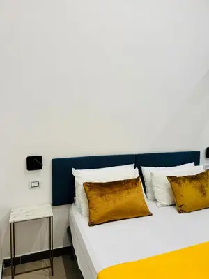 Letto o letti in una camera di Art Suite San Liborio