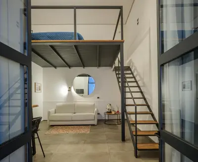 Letto o letti in una camera di ResidenzaScaleNapoletane