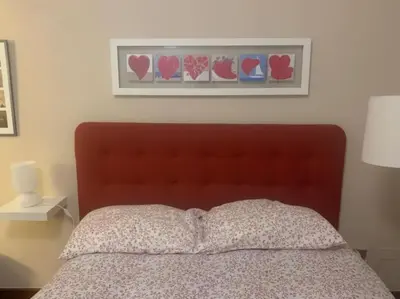 Letto o letti in una camera di Casetta Centrale di Bibi a Piazza Amedeo