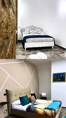 Letto o letti in una camera di Arco dei Borboni