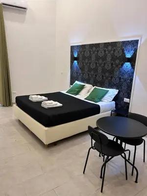Letto o letti in una camera di Olina residence 2
