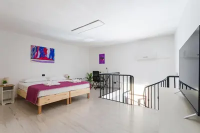 Letto o letti in una camera di Covino House by Dimorra